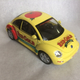 Illustration for article titled RED GOLD VW New Beatle 1:18